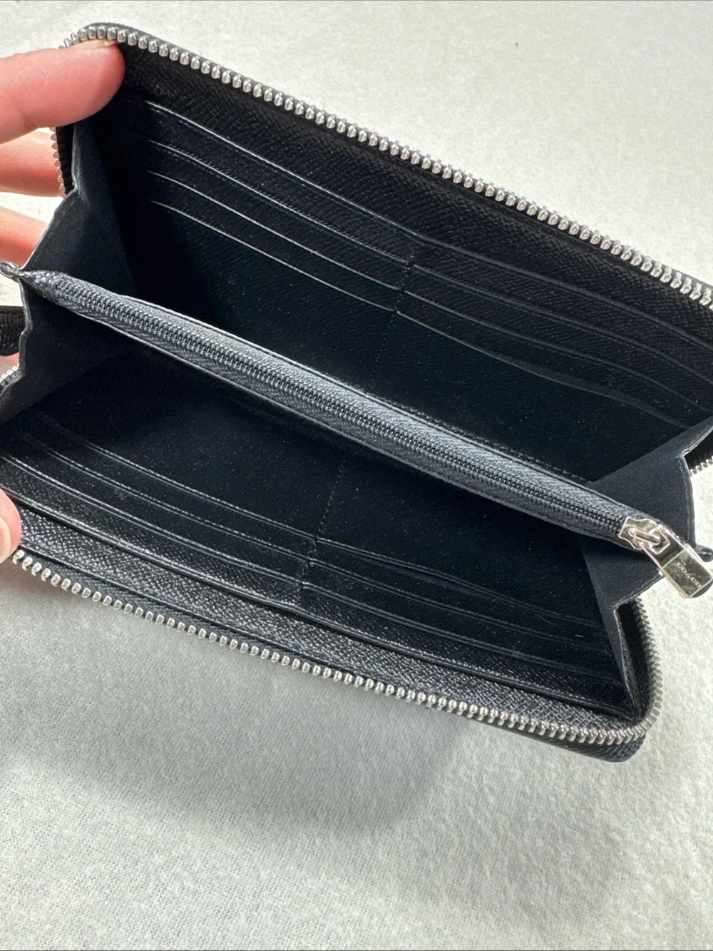 Coach sleek zip